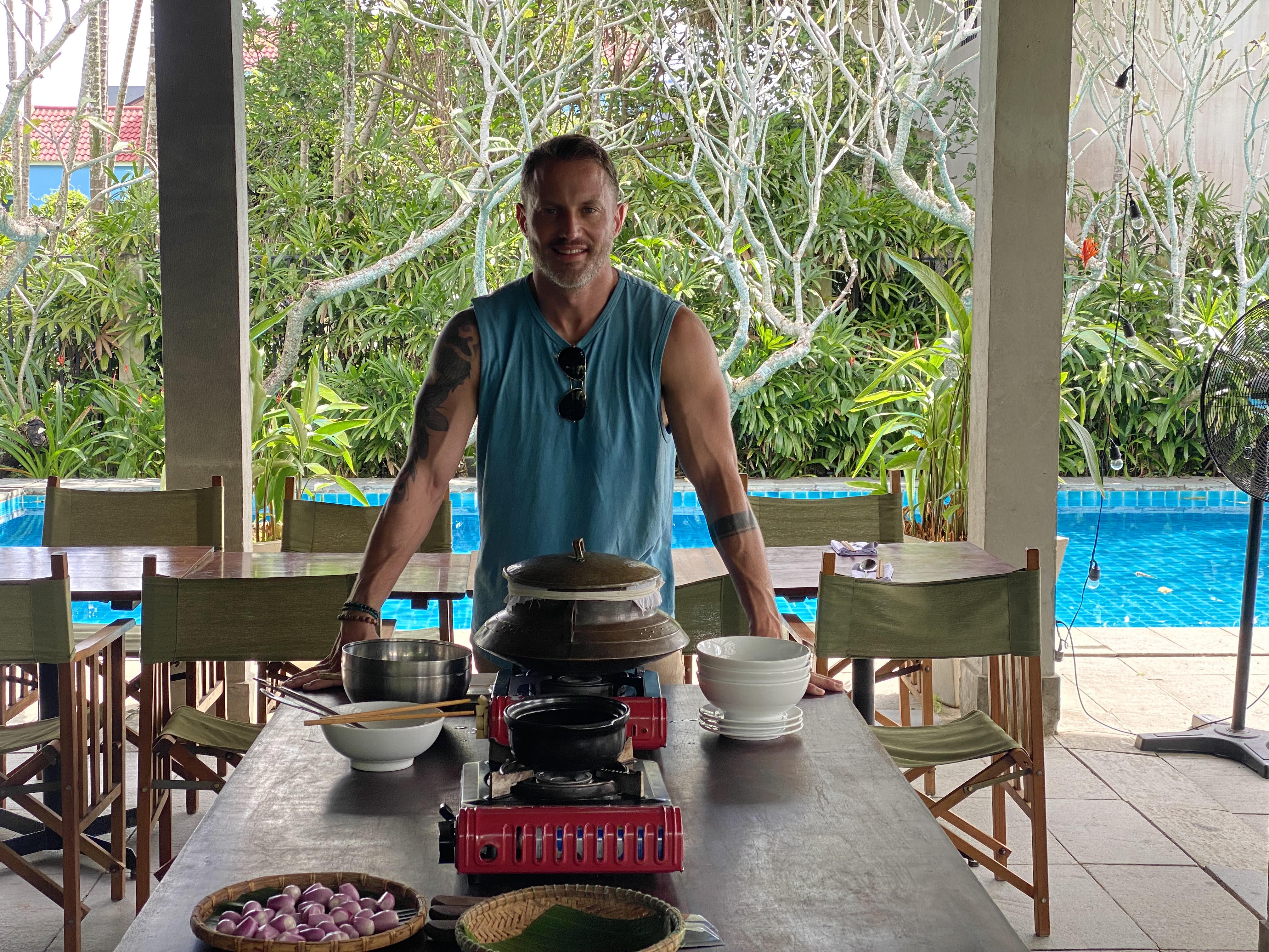 Spencer Allen at a poolside cooking class