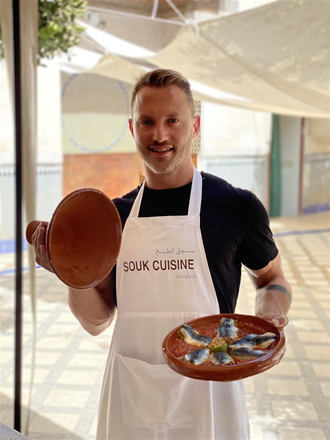 Spencer Allen cooking at a Souk Cuisine class in Marrakech